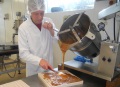 Jeff Casting the fudge from the vats.